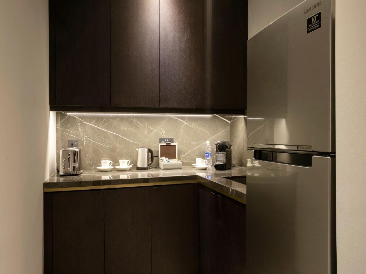 Hyatt Regency Al Kout Mall Κουβέιτ Εξωτερικό φωτογραφία A kitchen in a hotel room